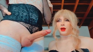 Blonde Shemale Strokes Her Thick Shaft